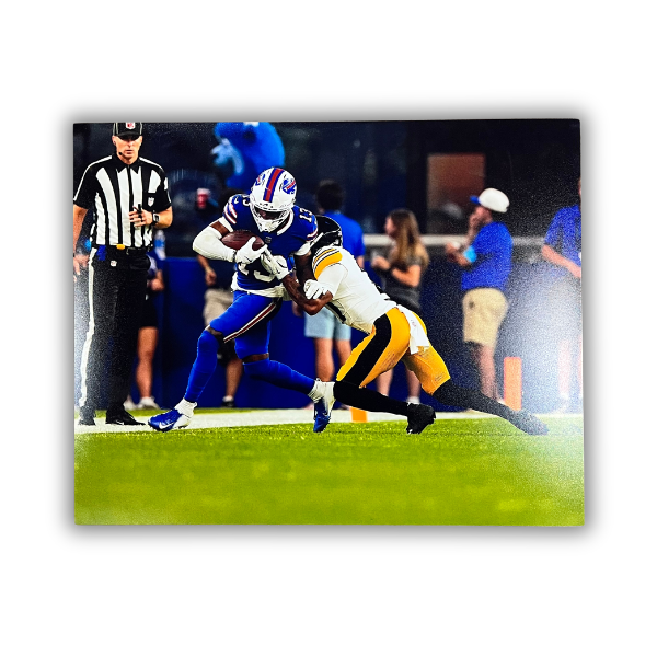 Skyler Bell Unsigned Breaking Tackle vs Steelers Photo