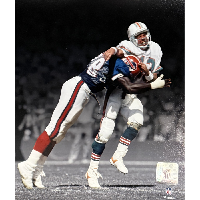 Bruce Smith Unsigned Sacking Marino 8x10 Photo