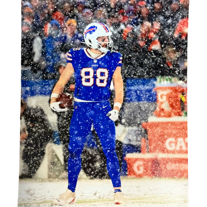 Dawson Knox Unsigned Holding Ball in Snow 8x10 Photo