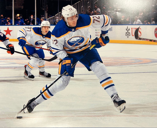 Tage Thompson Unsigned Shooting Puck In White 16x20 Photo Unsigned Photos TSE Buffalo 