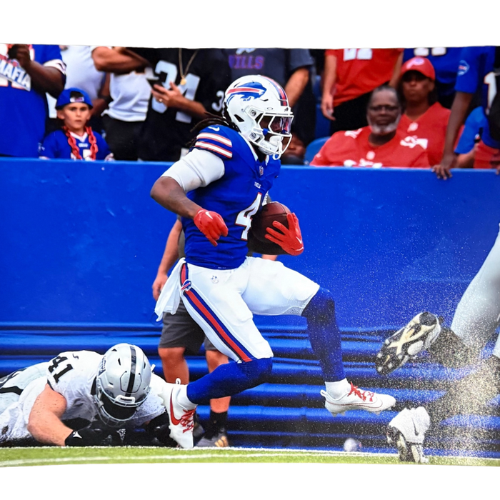 James Cook Unsigned Running with Ball vs. Raiders 8x10 Photo