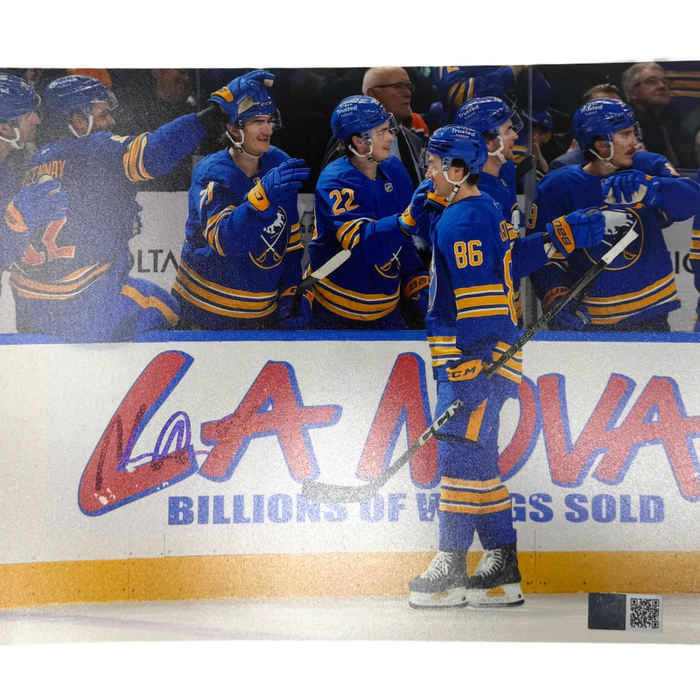 Noah Ostlund Signed Skating Near Sabres Bench Photo