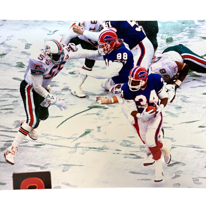 Thurman Thomas Unsigned Running in Snow 8x10 Photo
